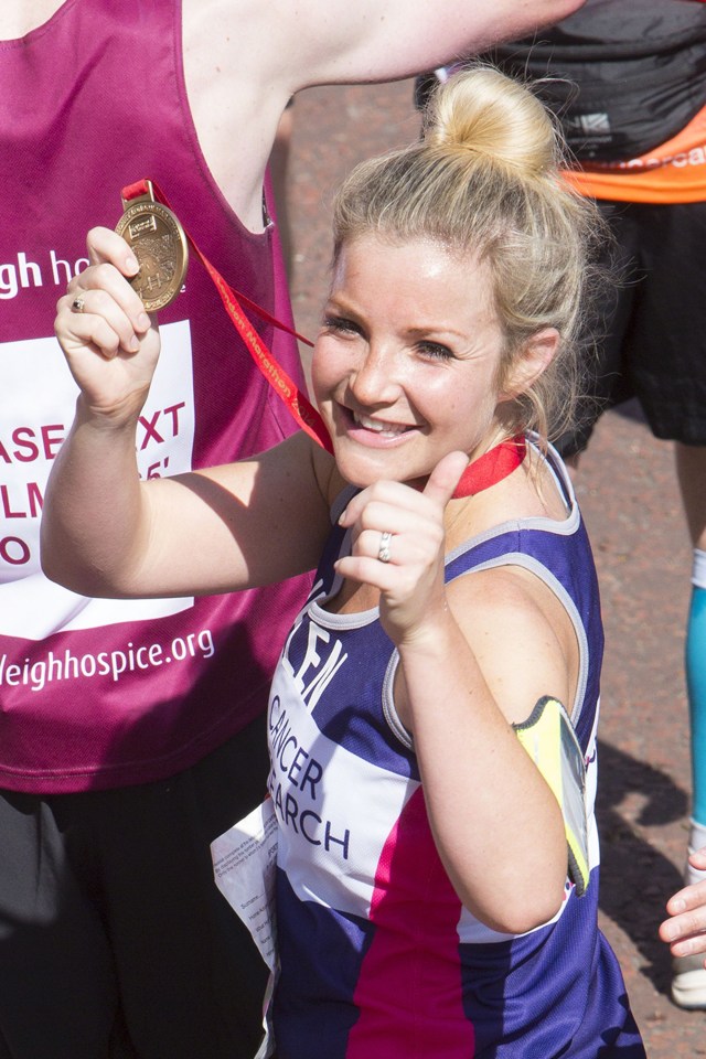  How does she look this good after running a marathon and throwing up?