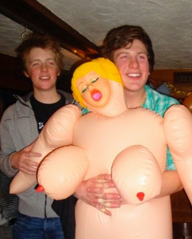  Top draw . . . Hugh larking with blow-up doll