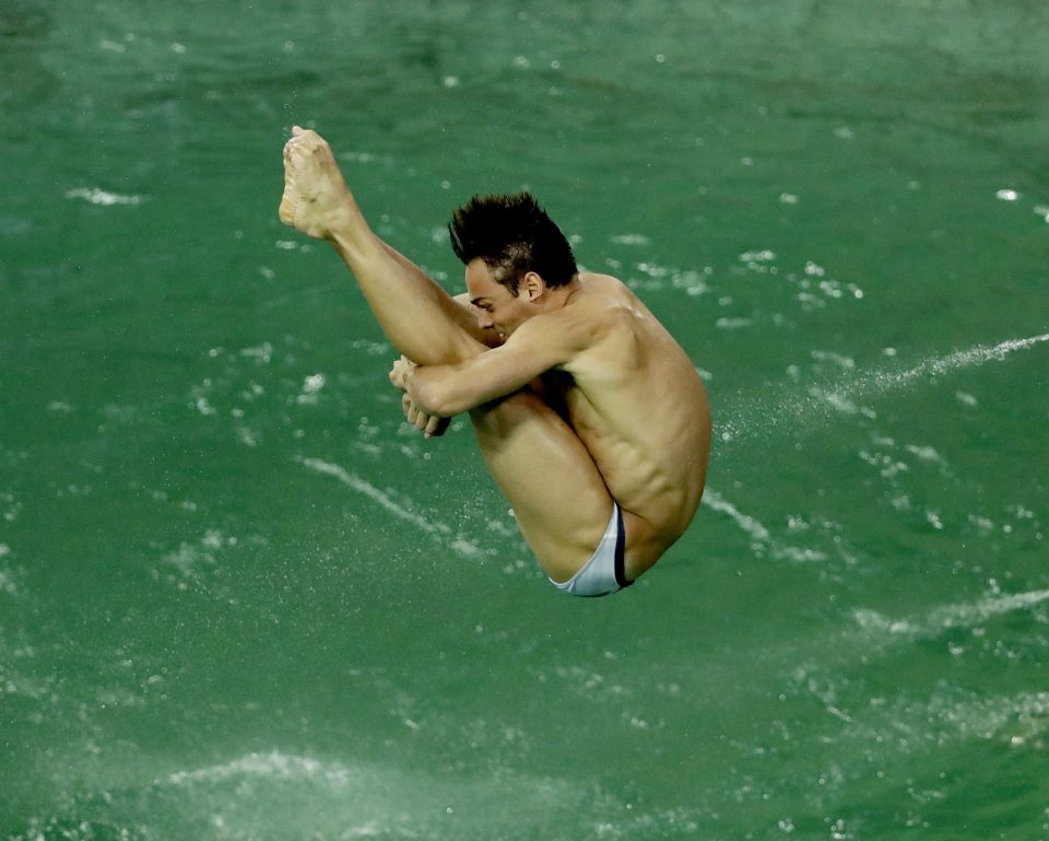  Tom Daley dives into the murky waters