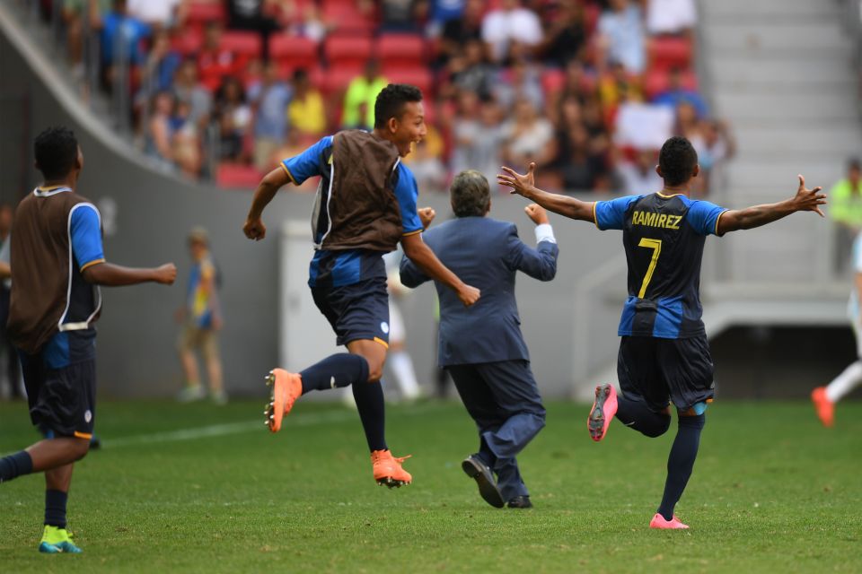  Honduras players react after reaching the Olympics quarter-finals