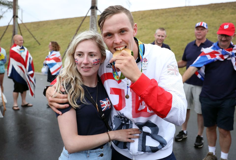  Joe Clarke gives his girlfriend Charlotte a hug after winning Olympic gold