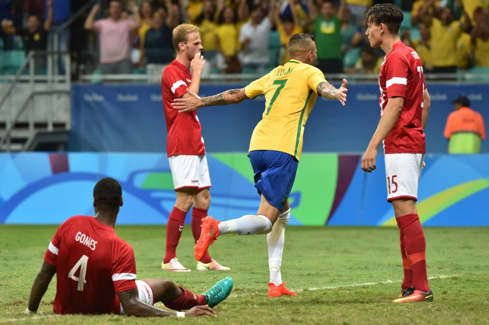  Luan celebrates after scoring Brazil's third goal just after half-time