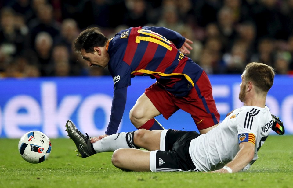  Mustafi tackles Barcelona's Messi as he shows he has the metal to take on the big players