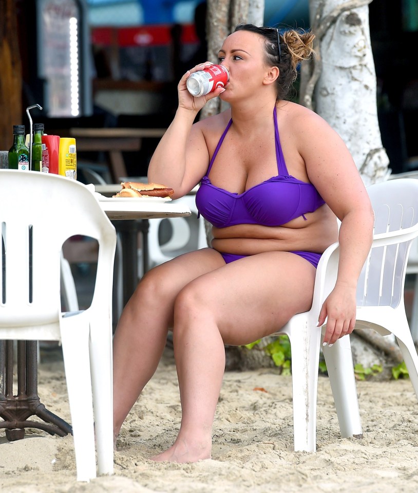  She washed down her lunch with a can of ice-cold Coke - the perfect holiday beverage