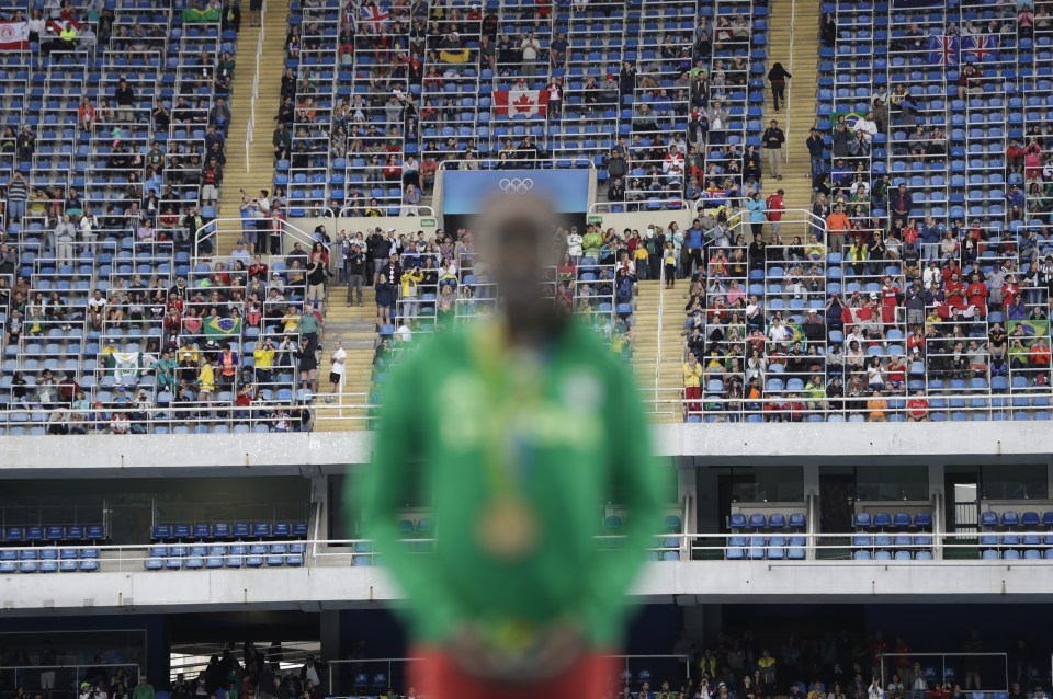  Ethiopia's Almaz Ayana on the podium after winning gold in front of just a few thousand spectators