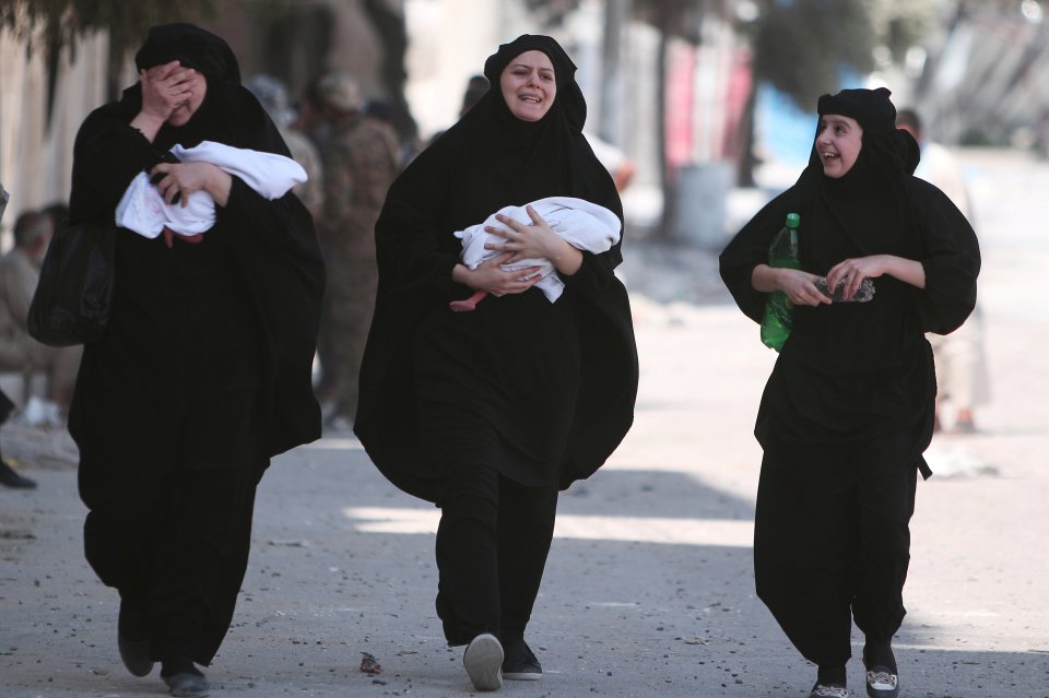  Women carry newborn babies while shedding tears of joy