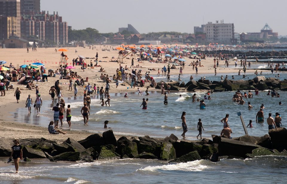  New Yorkers flocked to Coney Island beach to enjoy the heatwave