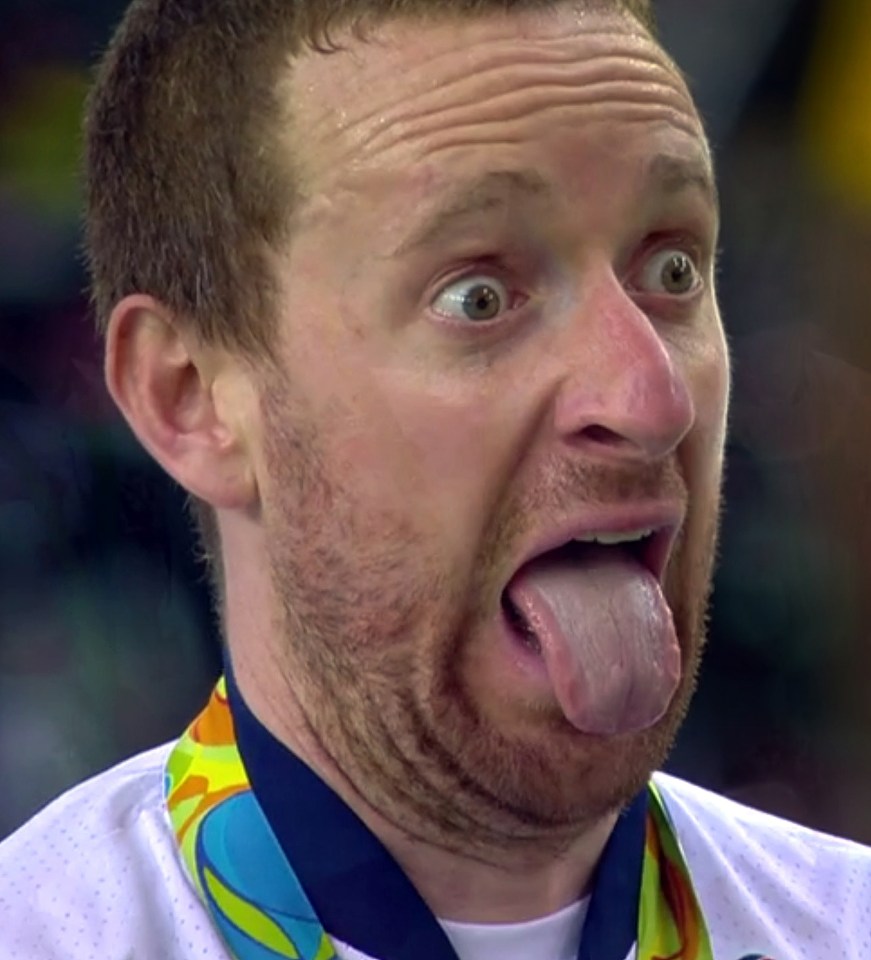  Wiggo celebrated his golden night by sticking his tongue out as he stood on the podium