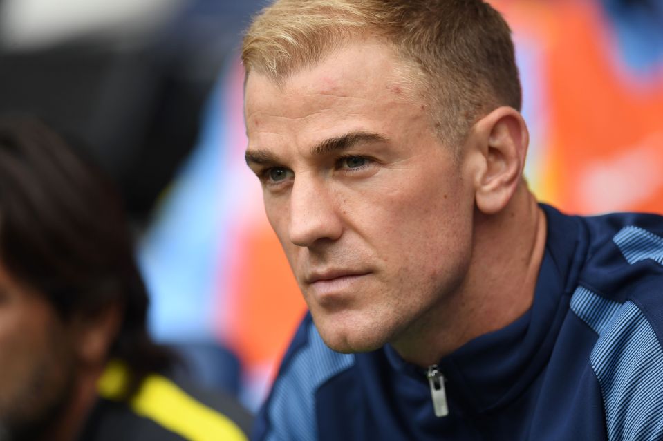  A bitter Joe Hart watches on from bench after being dropped against Sunderland