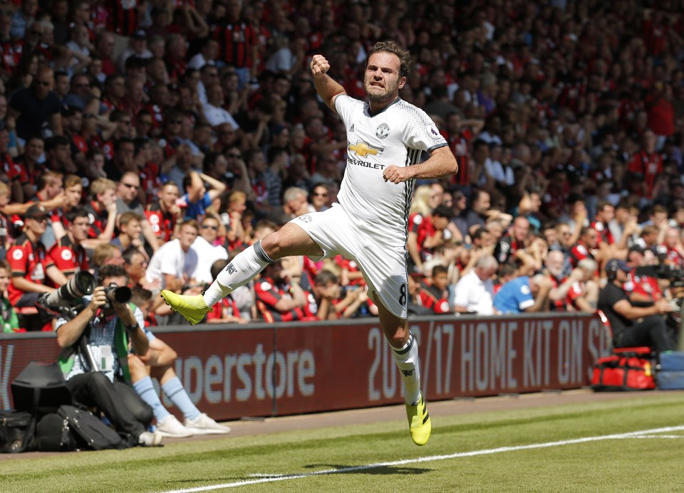  Juan Mata celebrates giving Manchester United the easiest of leads