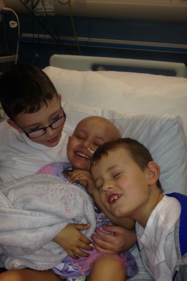  Millie with her brothers, Ryan, 9, and Aidan, 7