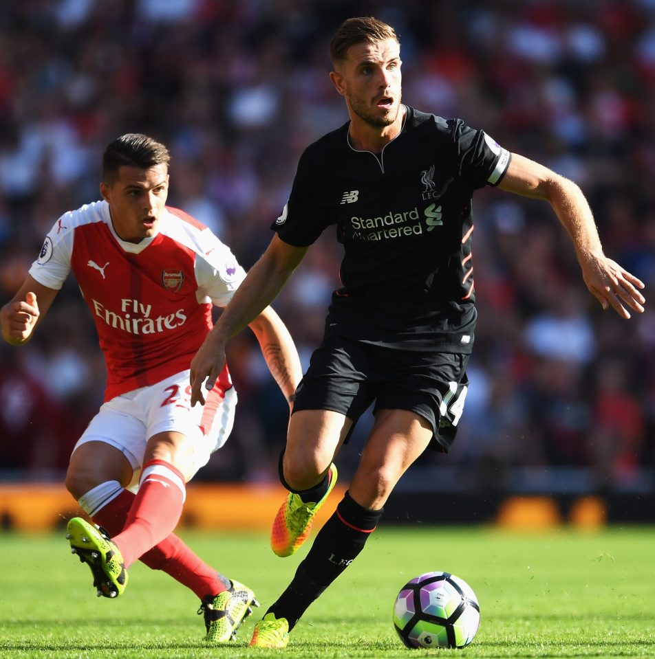 Xhaka on the prowl as he tries to close down Jordan Henderson