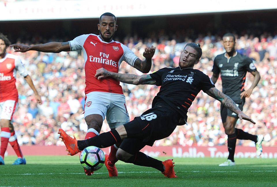  This clumsy challenge on Theo Walcott by Alberto Moreno handed Arsenal a penalty but the Spanish defender complained about the decision