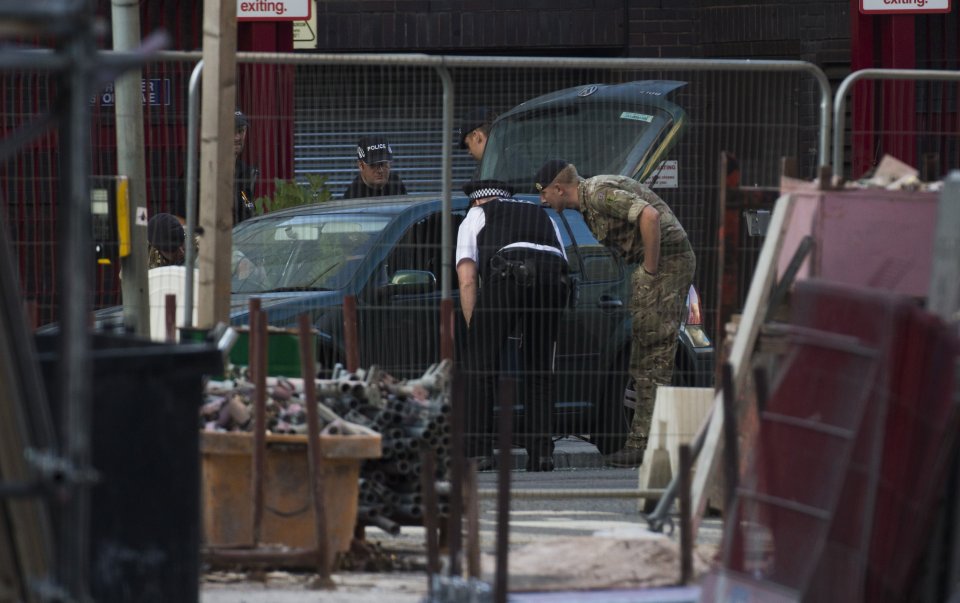  Controlled explosion ... army chiefs use explosive device to get into the vehicle