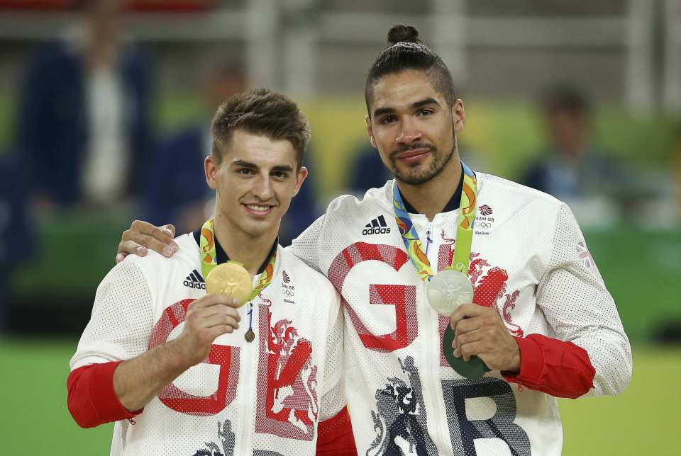  Louis with fellow Olympic champ Max Whitlock. who won gold in the Men's Pummel Horse final