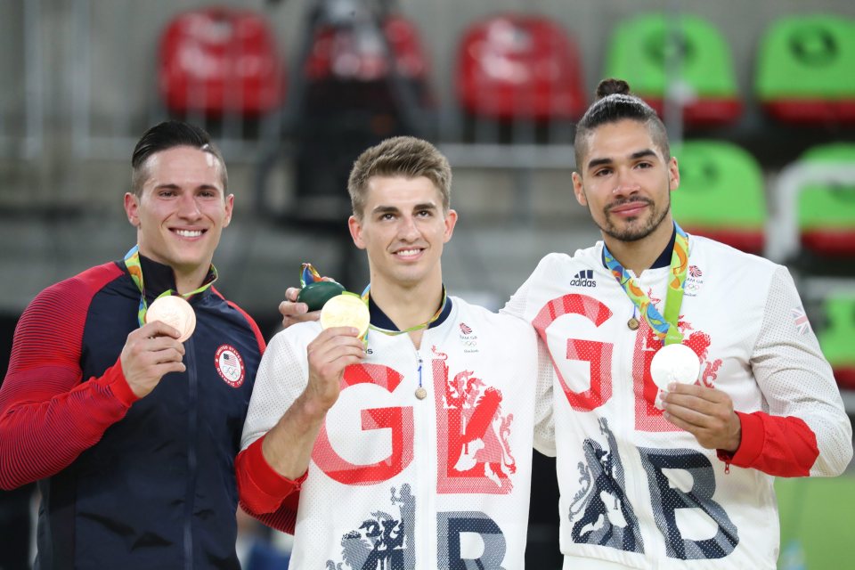  Alexander Naddour, Max Whitlock and Louis Smith (L-R) take to the podium