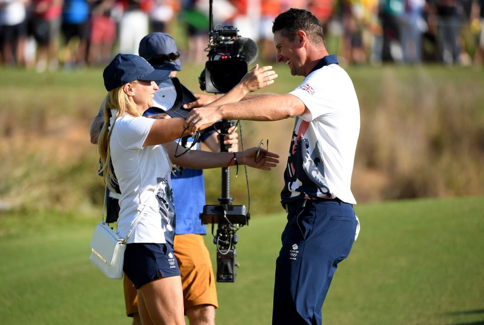  Rose celebrates with wife Kate after landing medal