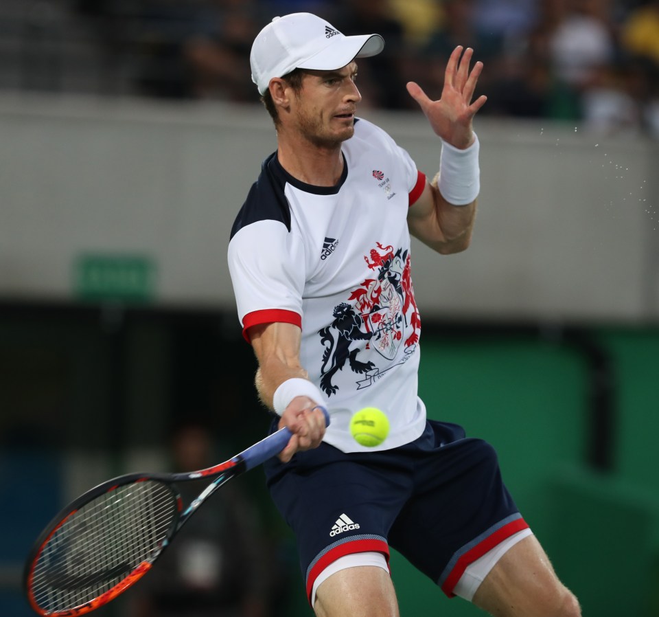  Andy Murray hits a forehand in the gold medal match of the Olympics