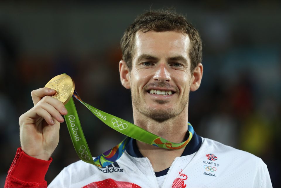  Andy Murray sports Olympic gold after beating Juan Martin del Potro