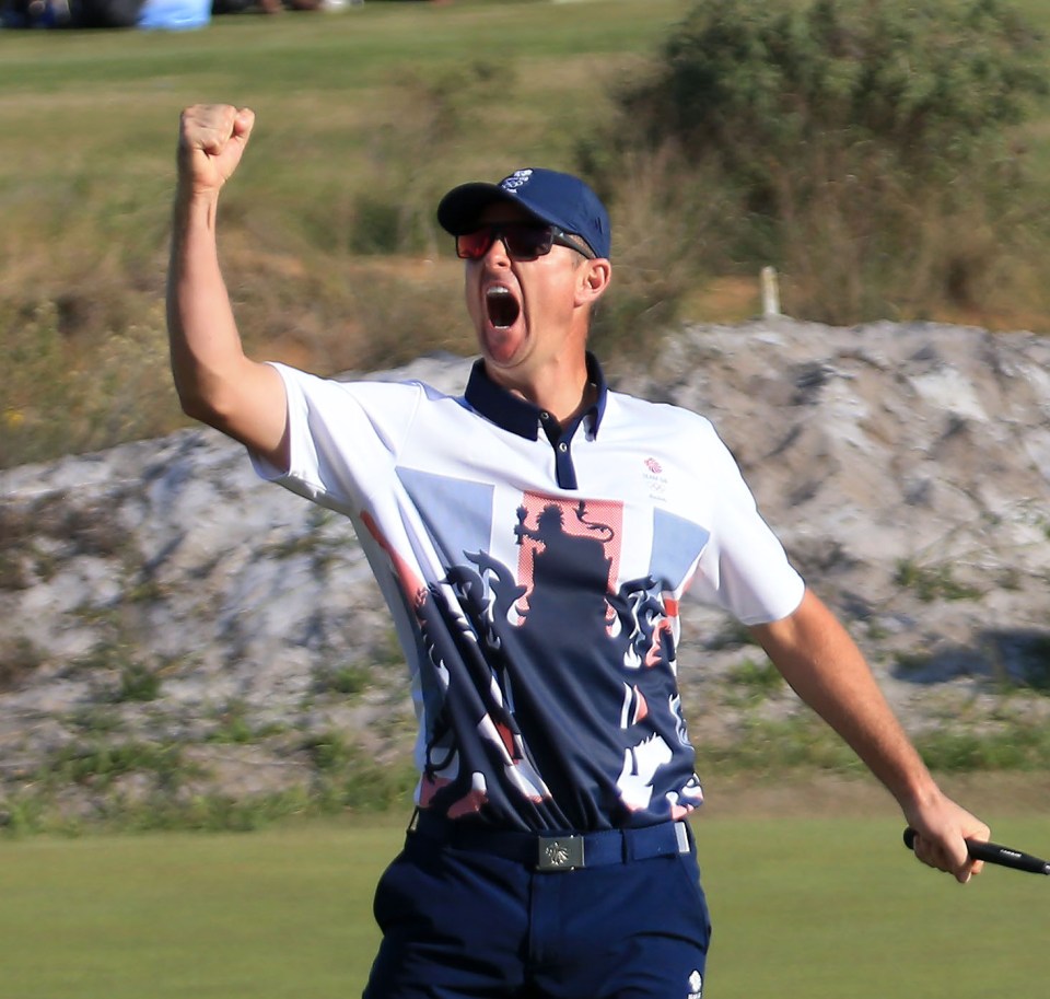  The Team GB star celebrates holing the putt that won him the gold medal