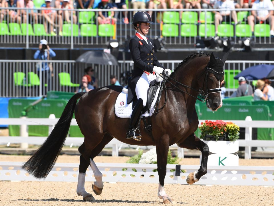  Dujardin performs her title-retaining routine on Valegro in Rio