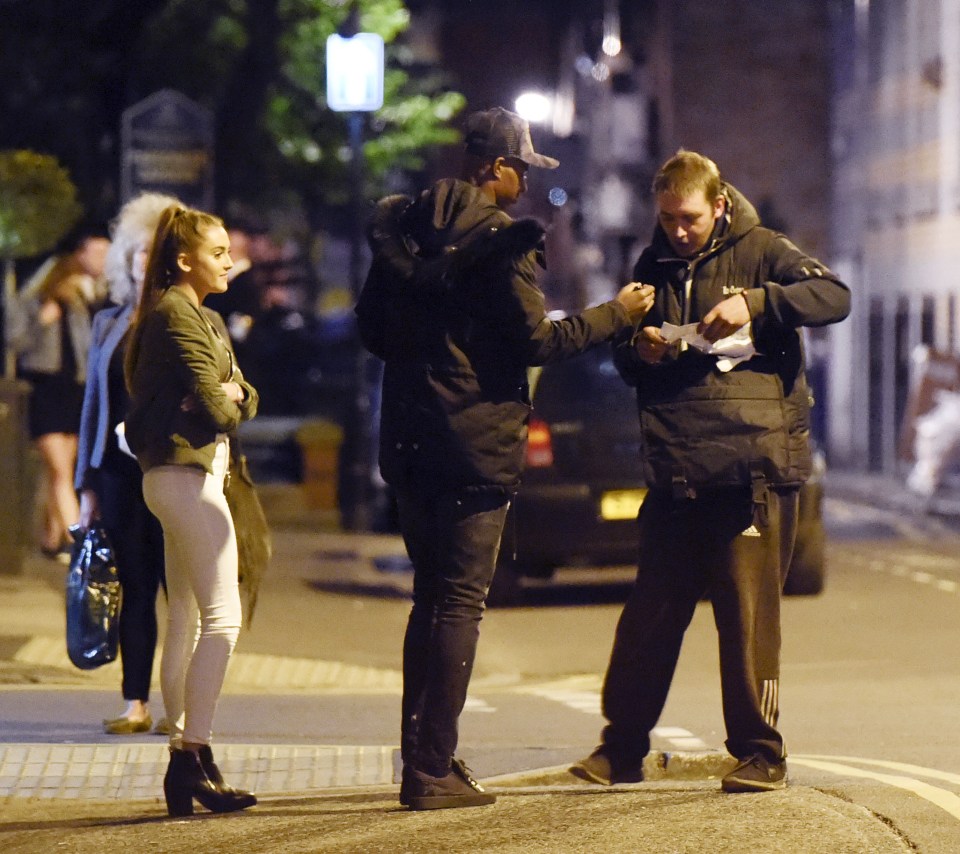  England man signs an autograph on the streets of Manchester following evening out