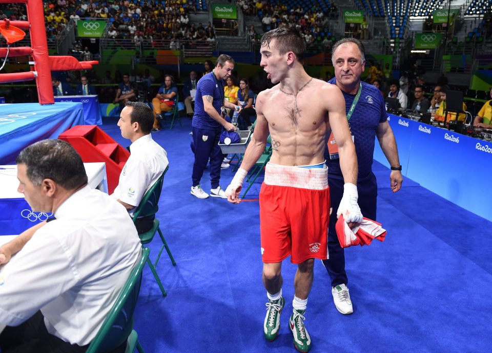 Conlan looks to the judges with disgust after his loss in the quarter-finals