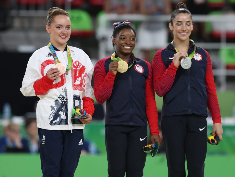  Silver medallist Aly Raisman of US, gold medallist Simone Biles of US, and Team GB's Amy Tinkler