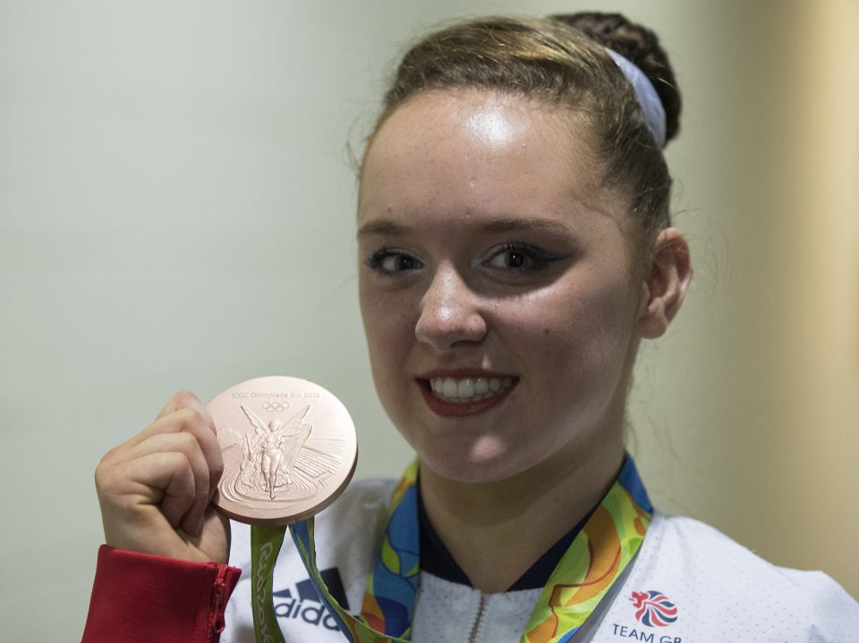  Team GB's Amy Tinkler celebrates with her bronze medal