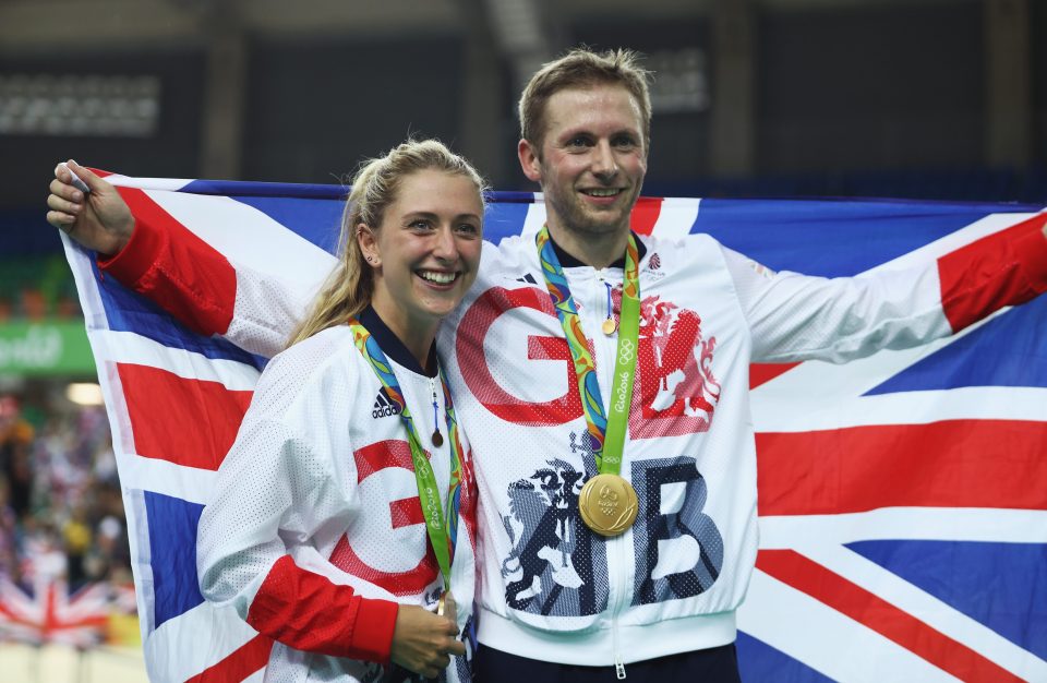  Trott and Kenny hold their medals aloft