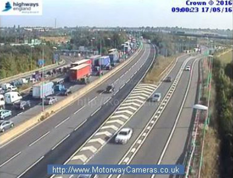  The Dartford Crossing is gridlocked today after a white BMW crashed into the barrier leaving two people in hospital