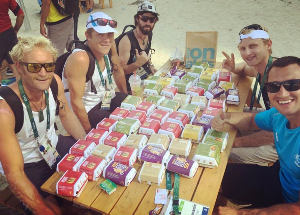  Coxless pair Eric Murray and Hamish Bond sit with their massive McDonald's order