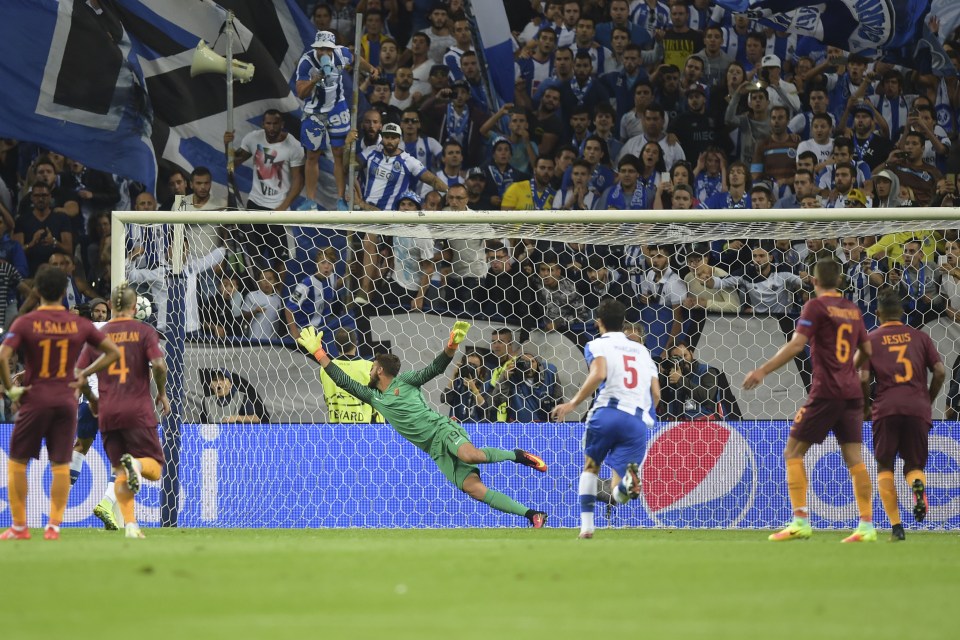  Andre Silva fires home Porto's equaliser from the penalty spot in the play-off round tie