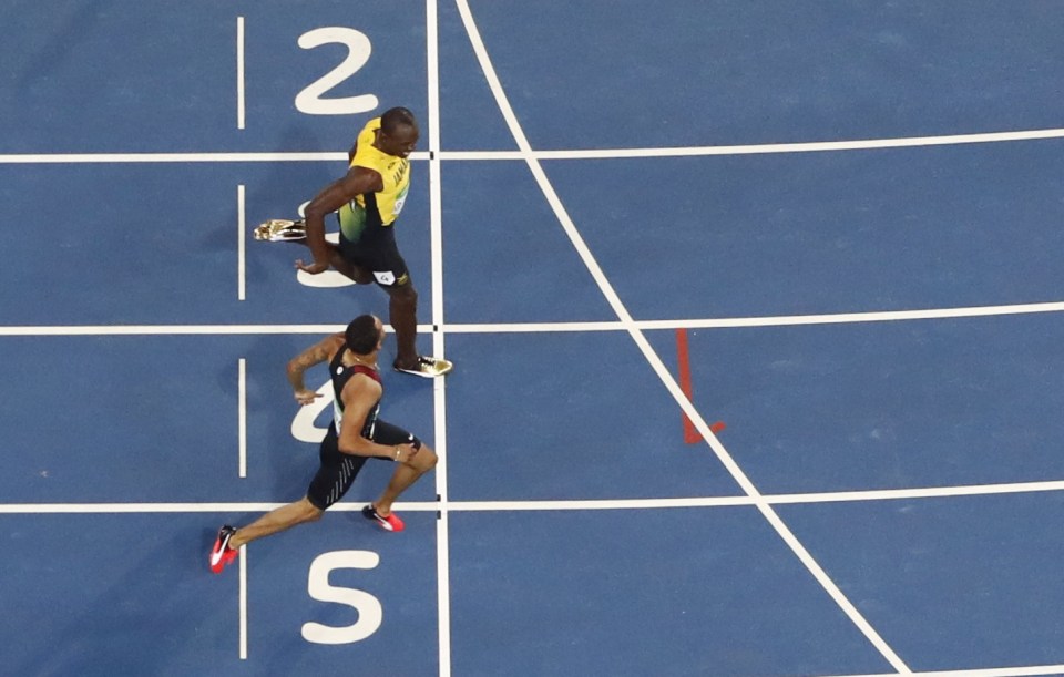  Canadian Andre De Grasse pushed Bolt all the way as the Jamaican slowed down