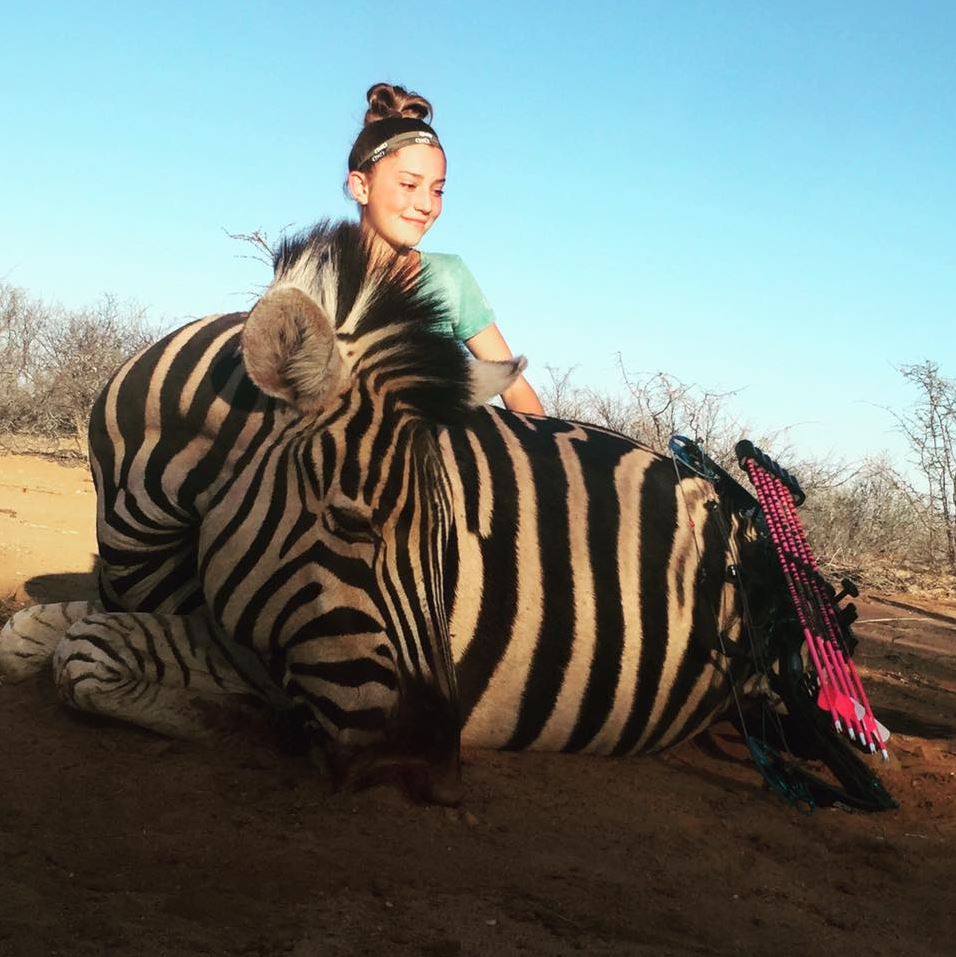  A picture of the girl sitting next to a dead zebra sparked more abuse online