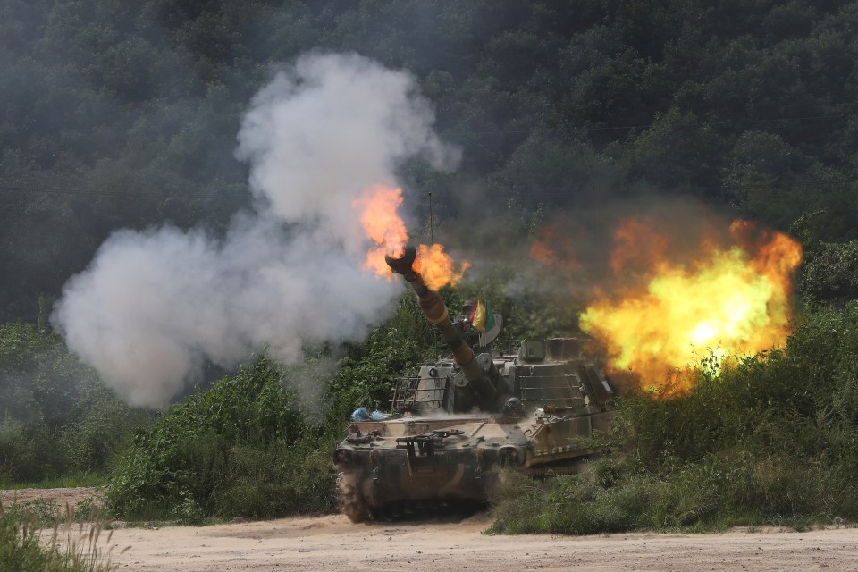  A South Korean howitzer fires during a military exercise in Yeoncheon near the border with North Korea on Thursday