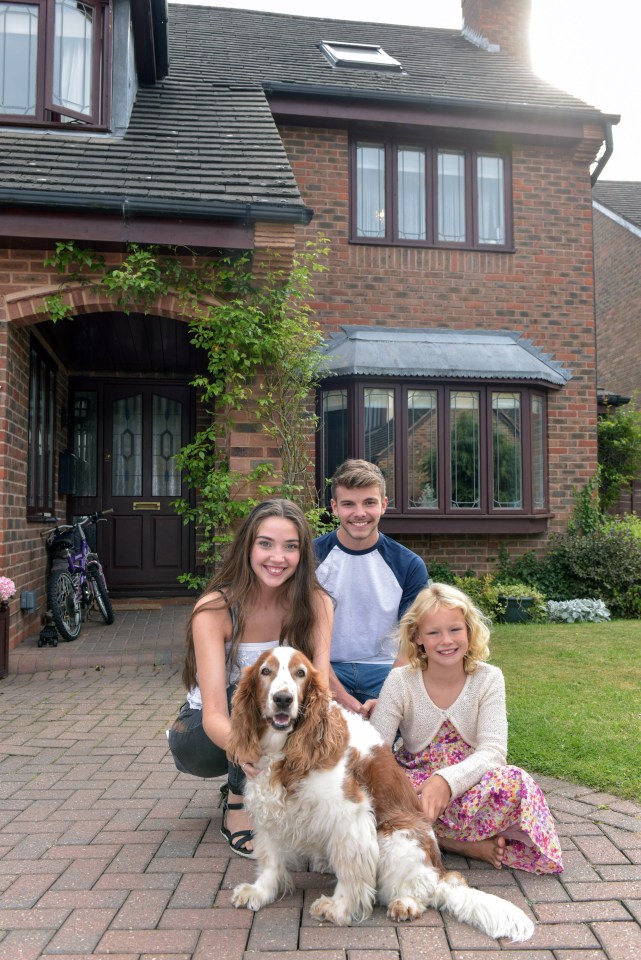  Roof-climbing Millie is pictured with Julia's daughter Alicia (left), son Dan, and daughter Elle