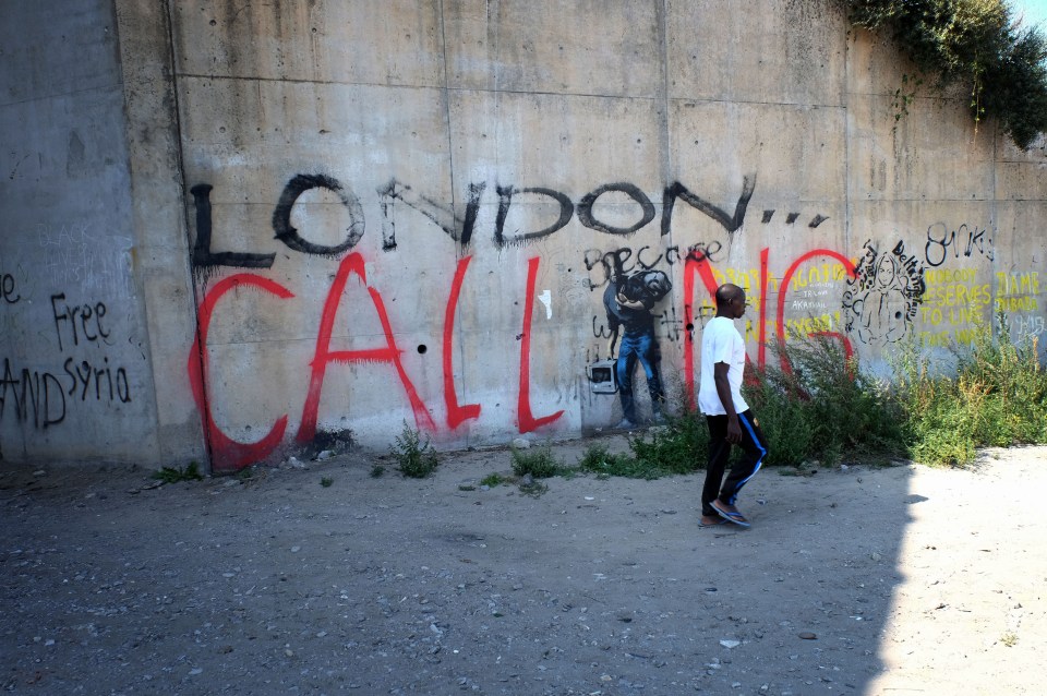  Graffiti at the entrance to the camp