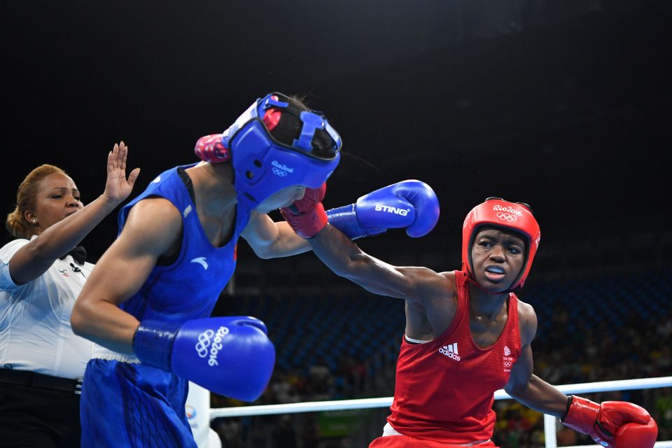  Nicola Adams won the final three rounds to beat Ren Cancan in the semi-final