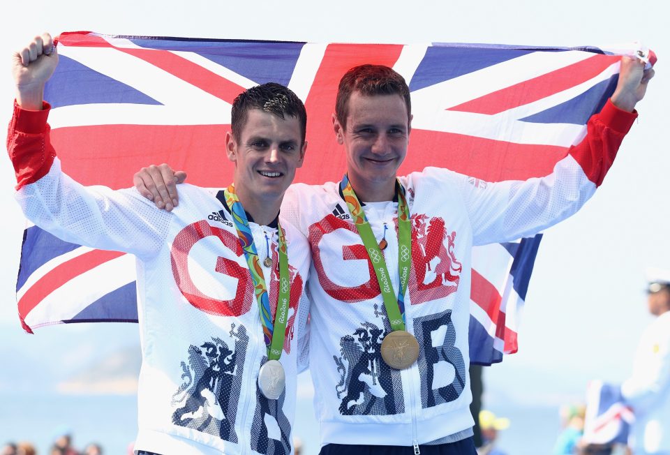  Alistair and Jonny celebrate with their gold and silver medals after the triathlon