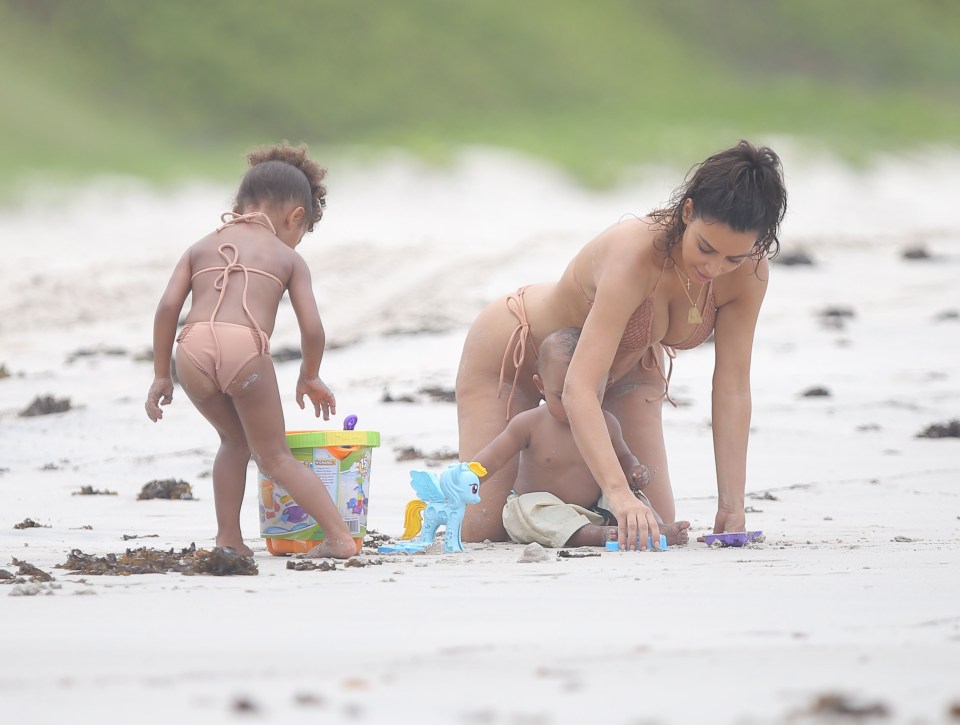 Kim Kardashian enjoyed her summer vacation with baby Saint and North West as they all play in the sand together at at Casa Aramara in Punta Mita Mexico