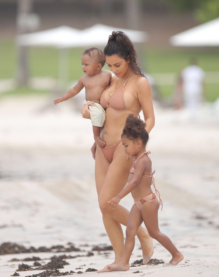 Kim Kardashian enjoyed her summer vacation with baby Saint and North West as they all play in the sand together at at Casa Aramara in Punta Mita Mexico