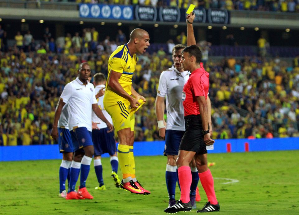  Maccabi forward Tal Ben Haim after receiving a yellow card against Hajduk Split