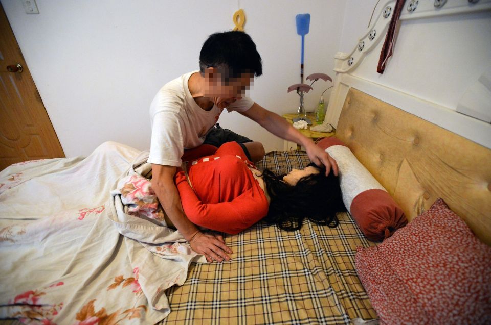  Zhang Wenliang, 70, bought the doll after his wife died from cancer