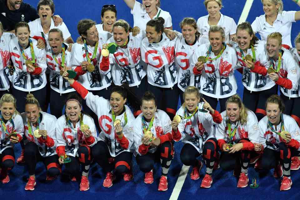  The British hockey team celebrate with their gold medals