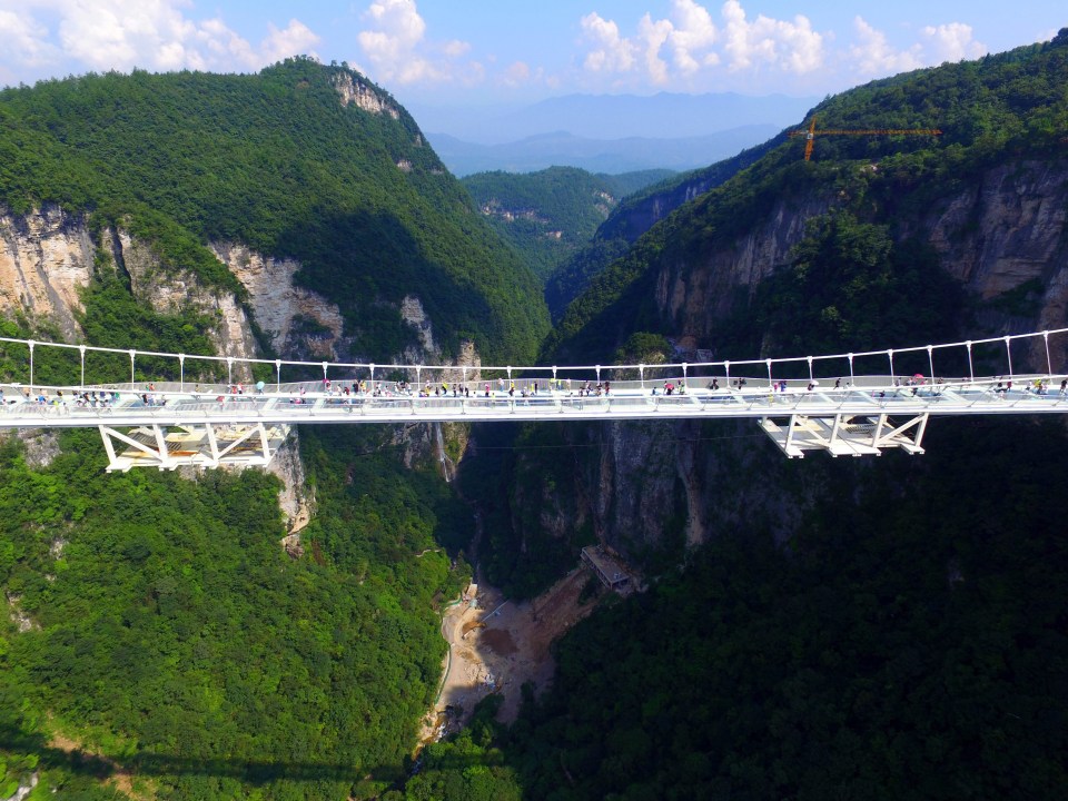  Only 8,000 people each day will be allowed to cross the bridge