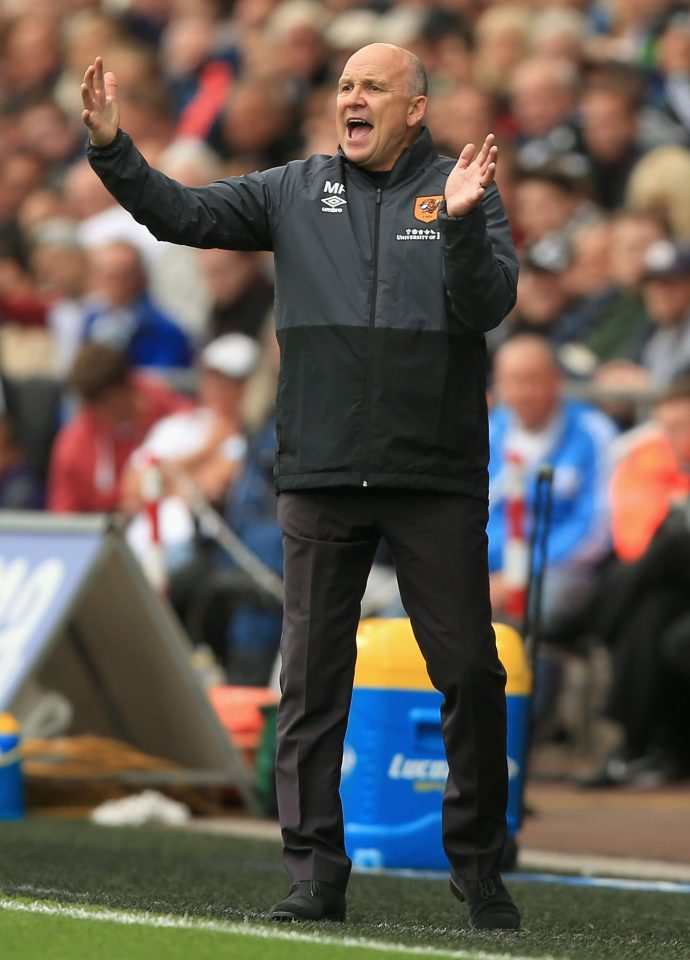  Caretaker Tigers boss Mike Phelan bawls out instructions for the visitors