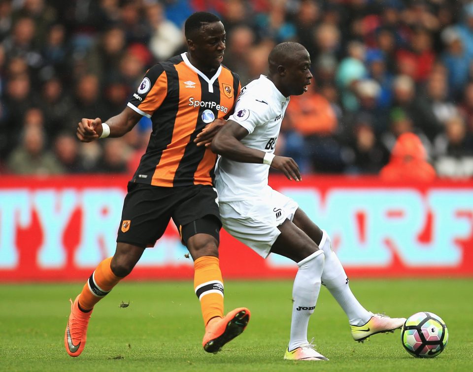  Swansea ace Modou Barrow tussles with Adama Diomande of newly-promoted Hull