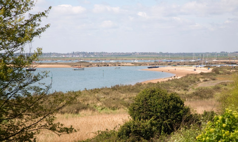  View over River Blackwater estuary, West Mersea, Mersea Island, Essex where today a windsurfer died after he was pulled from the water