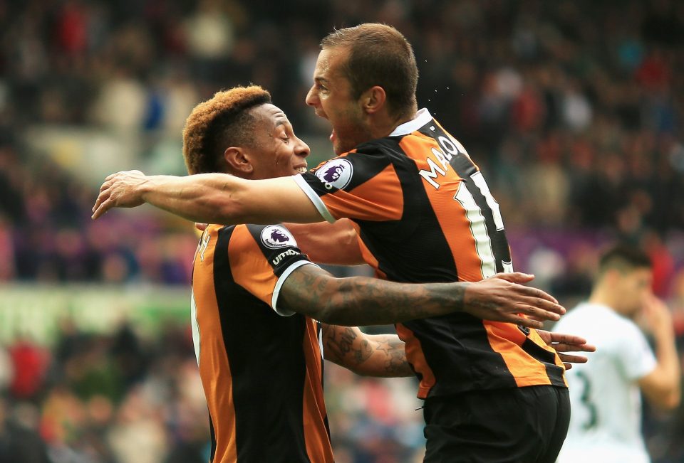  Hull scorers Maloney and Hernandez celebrate as the stun Swansea late on